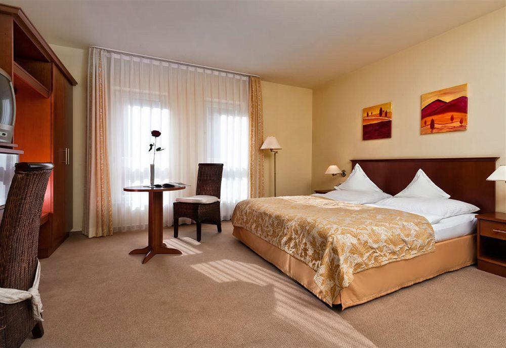 วินด์แฮม การ์เดน เควดลินบวร์ค ชตัดชลอสส์ Hotel เควดลินบวร์ก ห้อง รูปภาพ